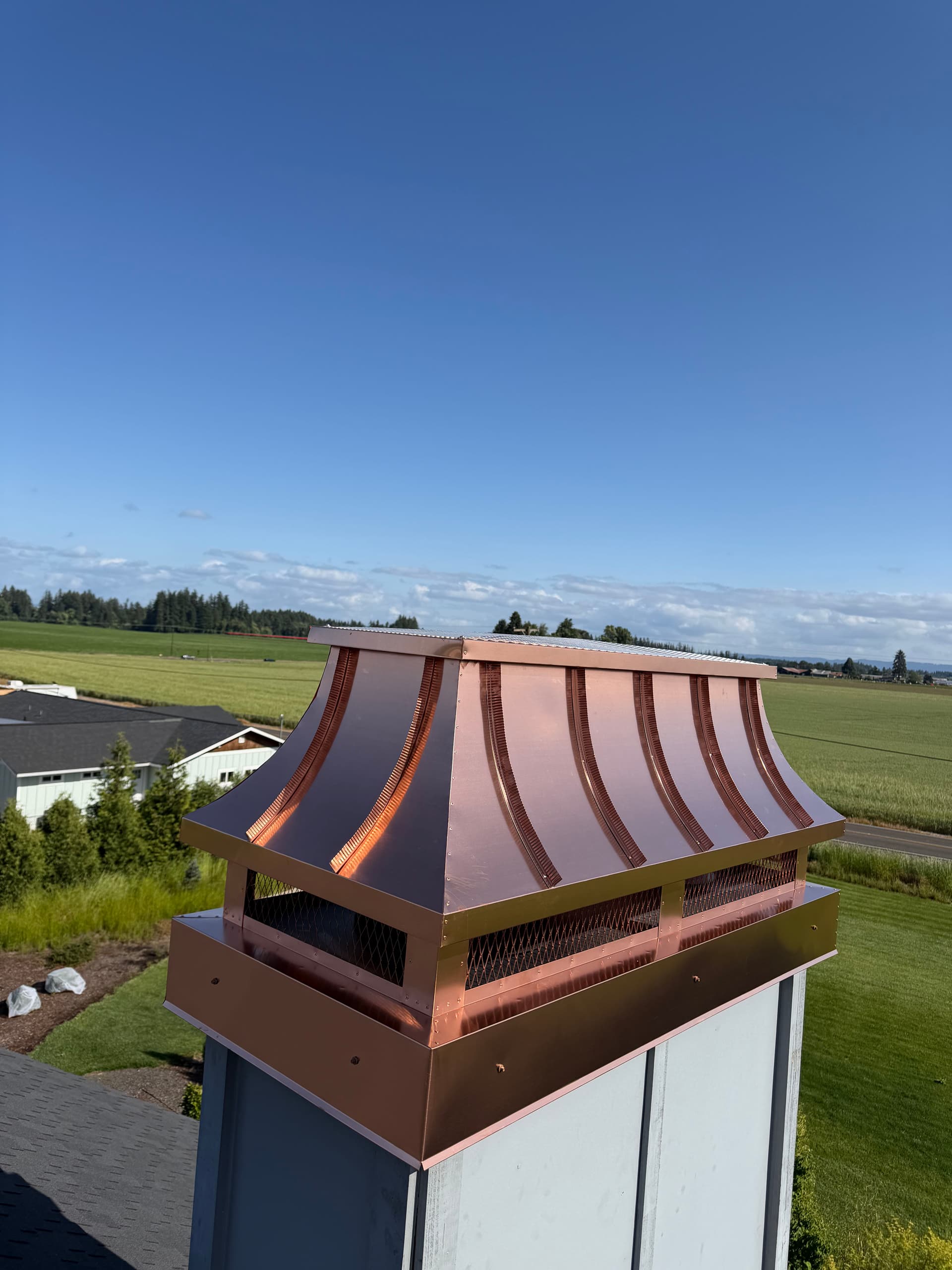 Gallery photos for Custom 16oz Copper Concave Chimney Cap Installed in Hillsboro Oregon: Image #1