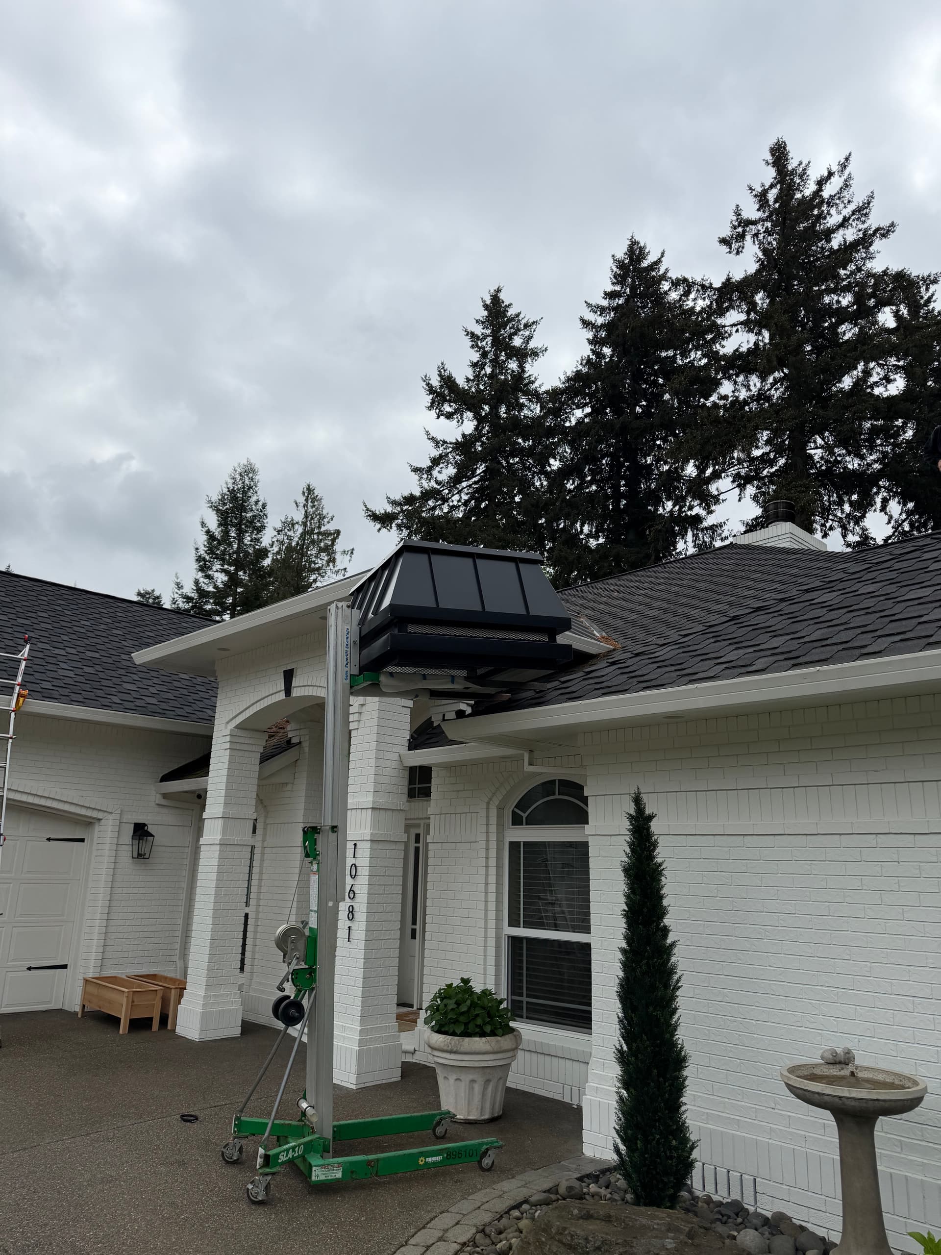 Gallery photos for Custom Black Standing Seam Chimney Cap Install in Wilsonville OR: Image #2