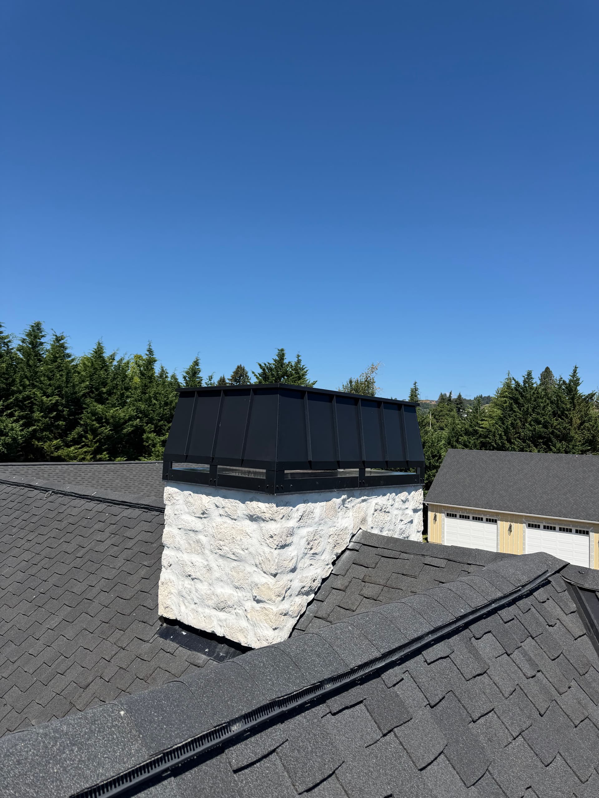Gallery photos for Custom Standing Seam Chimney Cap Fabricated and Installed in Washougal Washington: Image #1
