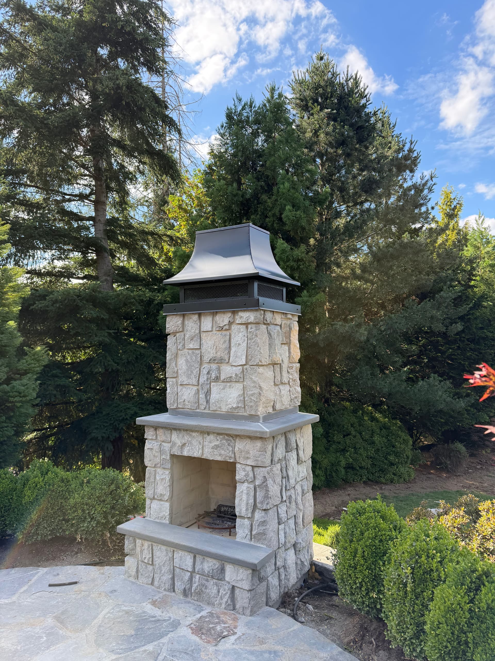 Custom Powder-Coated Concave Chimney Cap for Outdoor Fireplace in Oregon City image