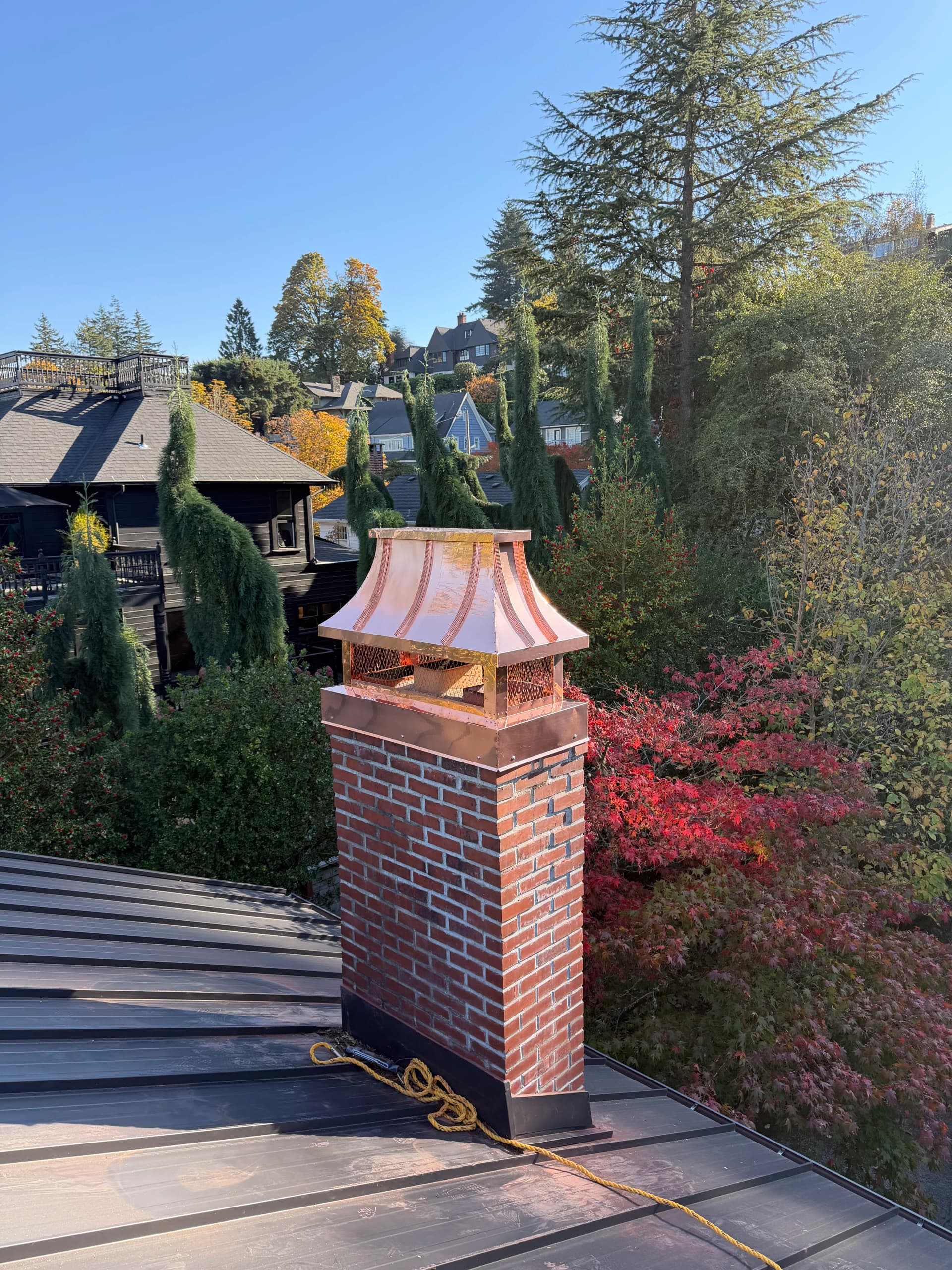 Gallery photos for Custom 20oz Copper Concave Chimney Cap Installed in Portland Oregon: Image #1